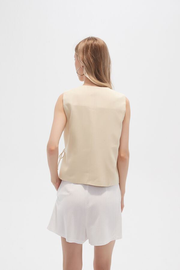 CHALECO FUSTA AMARILLO PALIDO image number null