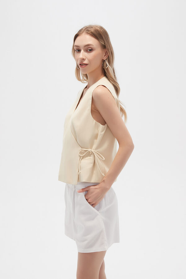 CHALECO FUSTA AMARILLO PALIDO image number null