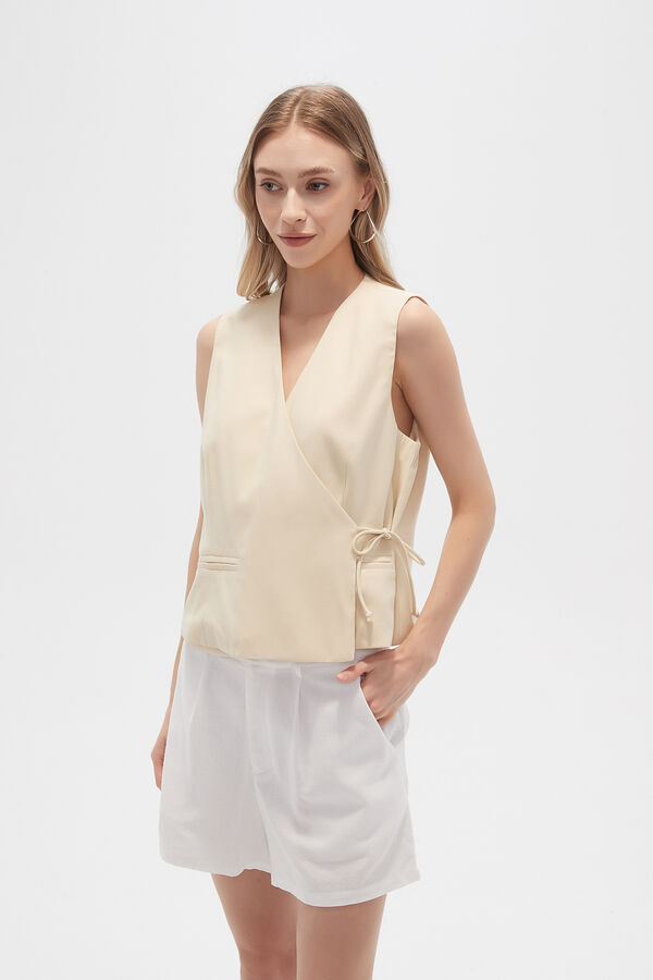 CHALECO FUSTA AMARILLO PALIDO image number null